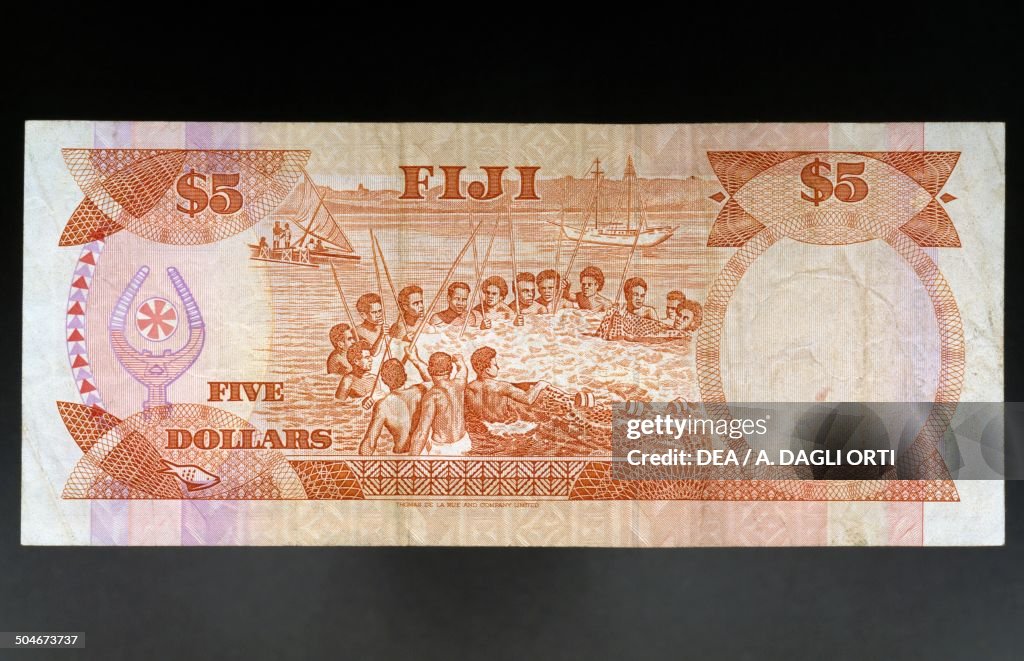 5 dollars banknote...