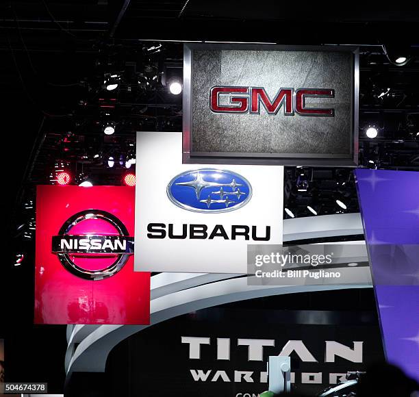 Car company signs are shown at the 2016 North American International Auto Show January 12, 2016 in Detroit, Michigan. The NAIAS runs from January...