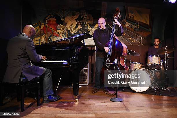 Jazz musicians Orrin Evans, Ben Wolfe, and Mark Whitfield, Jr. Perform on stage during the 2016 SESAC Jazz Awards on January 12, 2016 in New York...