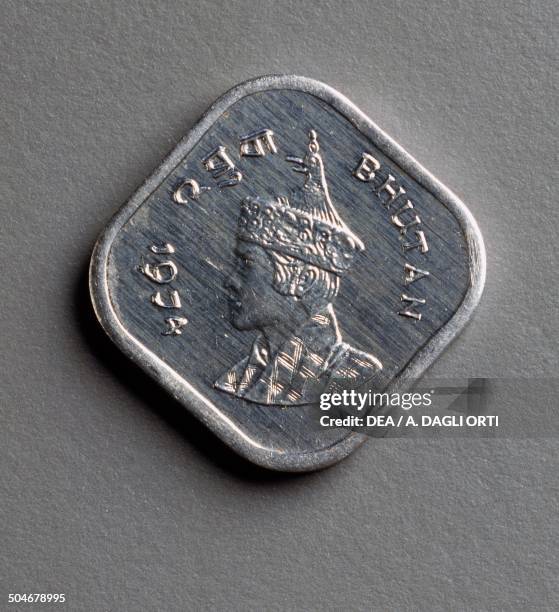 Chetrums coin obverse, portrait of Jigme Singye Wangchuck . Bhutan, 20th century.