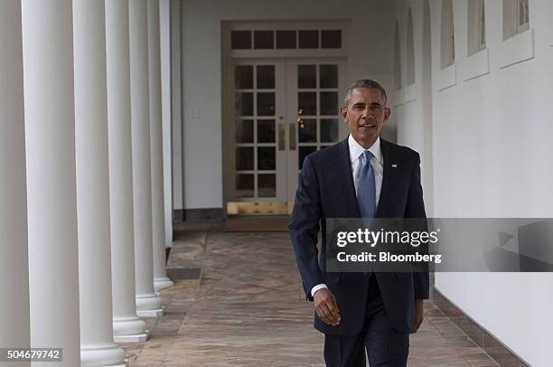 President Barack Obama walks from the Oval Office at the White House in Washington, D.C., U.S., on Tuesday, Jan. 12, 2016. Obama said he regrets that...