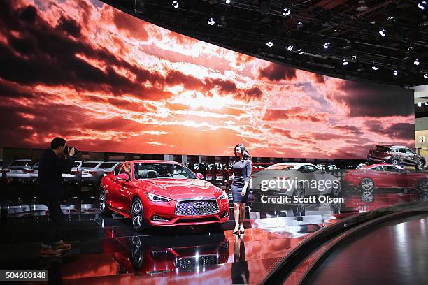 Infiniti shows off the Q60 at the North American International Auto Show on January 12, 2016 in Detroit, Michigan. The show is open to the public...