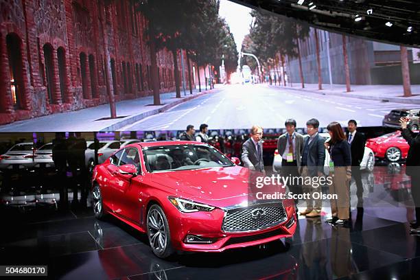 Infiniti shows off the Q60 at the North American International Auto Show on January 12, 2016 in Detroit, Michigan. The show is open to the public...