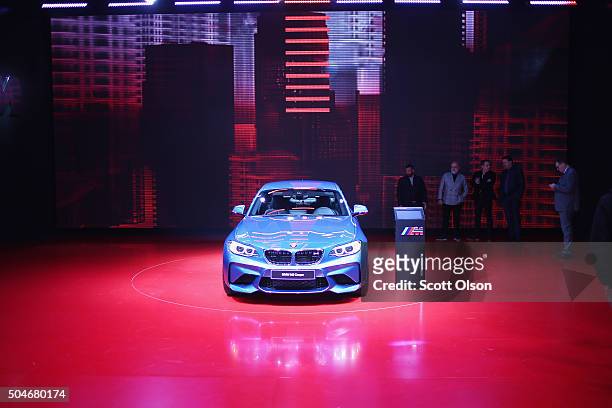 Shows off the new M2 Coupe at the North American International Auto Show on January 12, 2016 in Detroit, Michigan. The show is open to the public...
