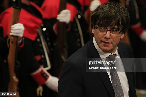 Carles Puigdemont, Catalonia's incoming president, arrives to be sworn into office at the Palau de la Generalitat in Barcelona, Spain, on Tuesday,...