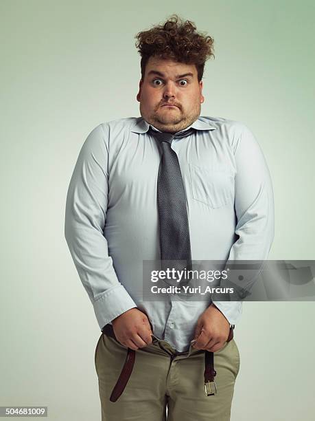 time to go on a diet - man in tight pants stock pictures, royalty-free photos & images