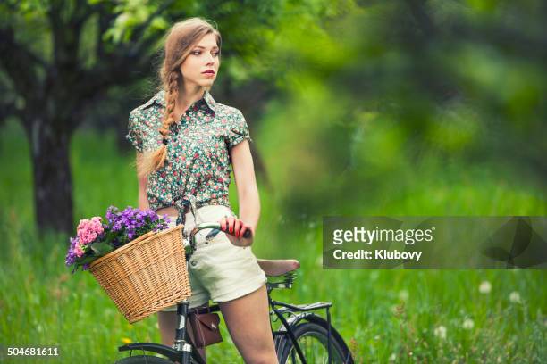 beauty on bicycle - bicycle basket stock pictures, royalty-free photos & images
