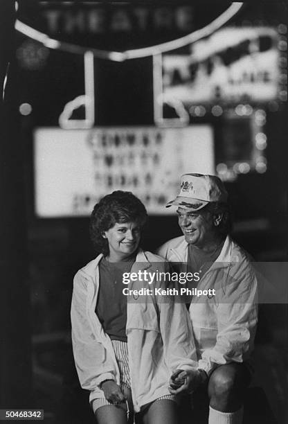 Singer Conway Twitty w. Wife Dee standing on Highway 76 strip.