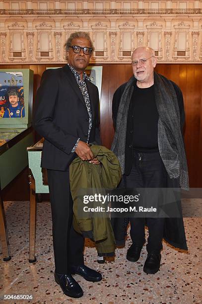 Marco Muller and Elvis Mitchell attend the opening 'Flesh, Mind and Spirit' at Fondazione Prada on January 12, 2016 in Milan, Italy.