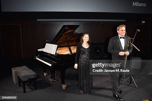 Irene Veneziano and Andrea Griminelli attend the opening 'Flesh, Mind and Spirit' at Fondazione Prada on January 12, 2016 in Milan, Italy.