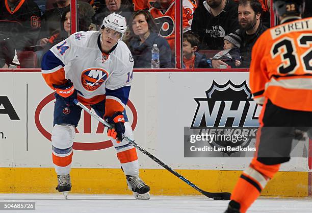 Thomas Hickey of the New York Islanders skates the puck against the Philadelphia Flyers on January 9, 2016 at the Wells Fargo Center in Philadelphia,...