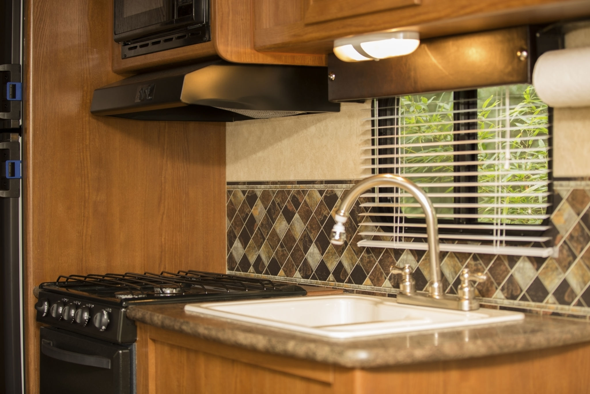 Interior, kitchen area of a motor home. Empty, nobody. Interior, kitchen area of a motor home. Empty, nobody.