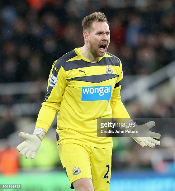 Rob Elliot of Newcastle United celebrates Aleksandar Mitrovic scoring their second goal during the Barclays Premier League match between Newcastle...