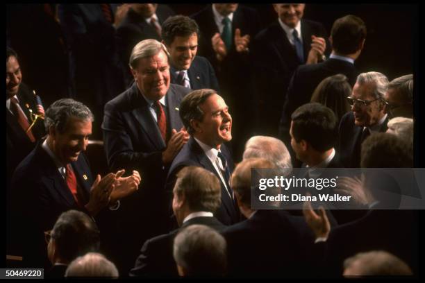 Pres. Bush applauded after addressing Joint Session of Congress, ringed by Hill & WH brass et al incl.