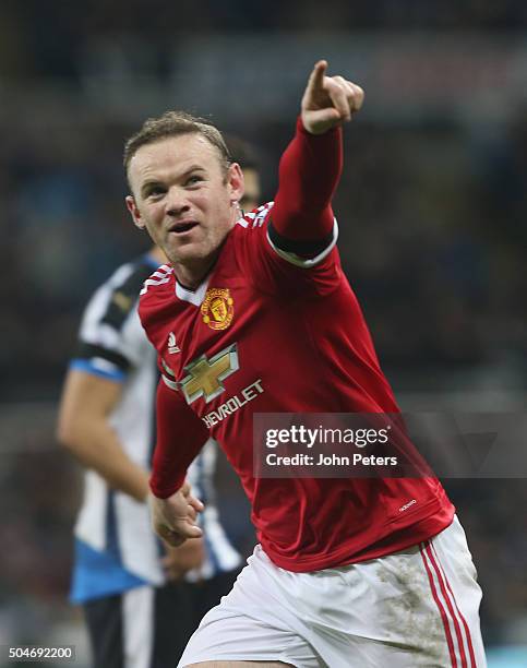 Wayne Rooney of Manchester United celebrates scoring their third goal during the Barclays Premier League match between Newcastle United and...