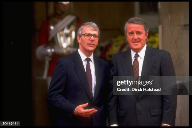 Canadian PM Brian Mulroney w. His host, PM John Major, arriving for G7 summit.