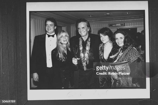 Singer Johnny Cash celebrating w. His family John, Carlene, Rosanne & wife June Carter at seventh annual Rock & Roll Hall of Fame.