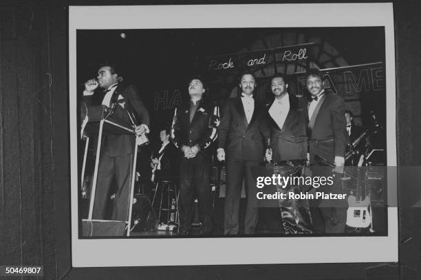 Musician Ronald Isley w. His band Ernie, Rudolph & Marvin & Little Richard at seventh annual Rock & Roll Hall of Fame.