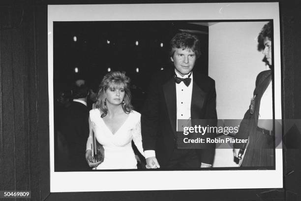 Musician John Fogerty w. Unident. Woman at seventh annual Rock & Roll Hall Fame.