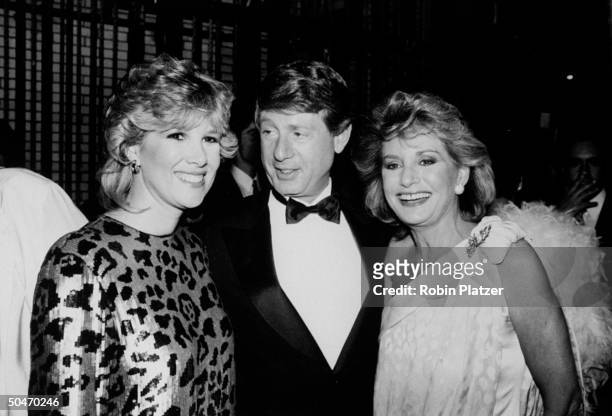 Journalists Joan Lunden, Ted Koppel and Barbara Walters dressed glamorously.