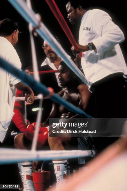 October 2, 1980 - Las Vegas:Defeated boxer Muhammad Ali with trainer Angelo Dundee and Dr. Donald Romeo, after Dundee stopped fight vs. Larry Holmes.