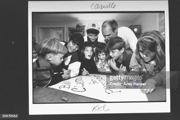 James Carville , pol. Consultant for Dem. Pres. Cand. Bill Clinton, supervising the work of his young nieces & nephews as they make up a BILL CLINTON...