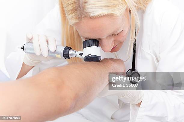 dermoscopy - melanoma stock pictures, royalty-free photos & images