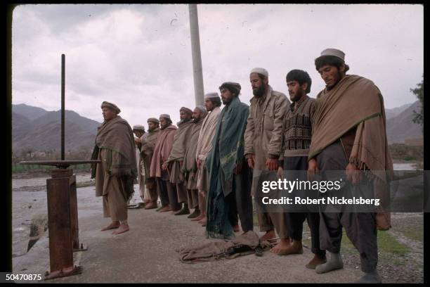 Afghan ethnic Pathan mujahedin offering prayers in rebel-controlled Kunar province capital Asadabad.