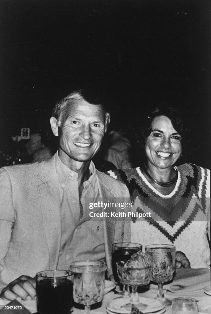 Snapshot of church builder Roe Messner w. his wife Ruth Ann sitting