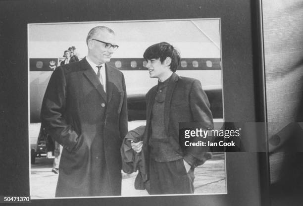 Actor Leonard Whiting chatting w. Actor Laurence Olivier while they stand on tarmac at Heathrow Airport before boarding plane to Russia during Nat'l...