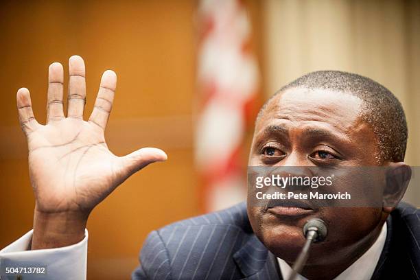 Forensic pathologist and neuropathologist Dr. Bennet Omalu participates in a briefing sponsored by Rep. Jackie Speier on Capitol Hill on January 12,...