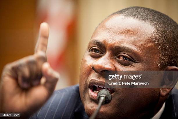 January 12: Forensic pathologist and neuropathologist, Dr. Bennet Omalu, who discovered CTE in former NFL players, participates in a briefing...