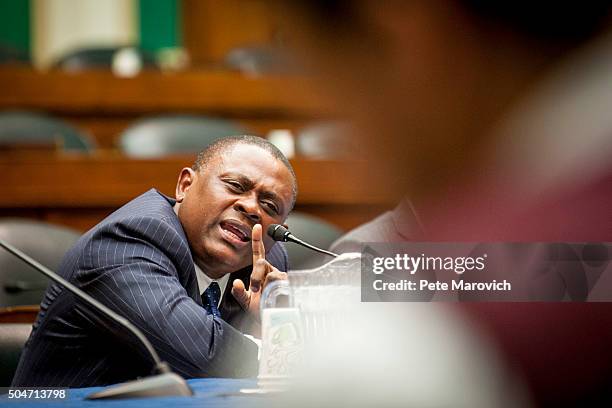 Forensic pathologist and neuropathologist Dr. Bennet Omalu participates in a briefing sponsored by Rep. Jackie Speier on Capitol Hill on January 12,...