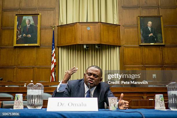 Forensic pathologist and neuropathologist Dr. Bennet Omalu participates in a briefing sponsored by Rep. Jackie Speier on Capitol Hill on January 12,...