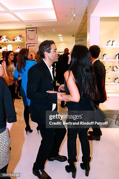 Artist JonOne and his wife Mai Lucas Perello dance during the Guerlain collaboration with Graffiti Artist JonOne, Color Flows Exhibition Launch's...