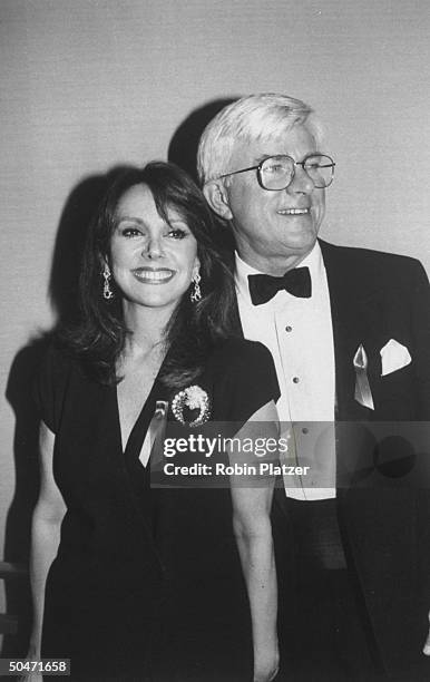 Personality Phil Donahue and wife, actress Marlo Thomas backstage at the Daytime Emmy awards he co-hosted.