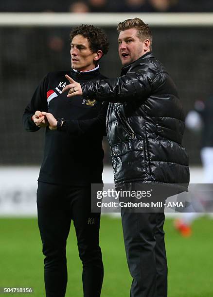 Karl Robinson manager of MK Dons and coach Keith Andrews during the Sky Bet Championship match between MK Dons and Burnley at Stadium mk on January...