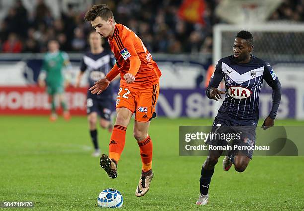 Benjamin Jeannot for Lorient and Andre Biyogo Poko for Bordeaux in action during the French League Cup quarter final between Bordeaux and Lorient at...