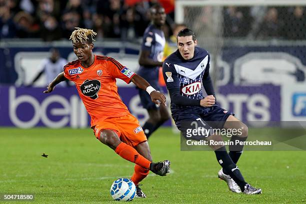 Ibrahim Didier Ndong for Lorient and Enzo Crivelli for Bordeaux in action during the French League Cup quarter final between Bordeaux and Lorient at...