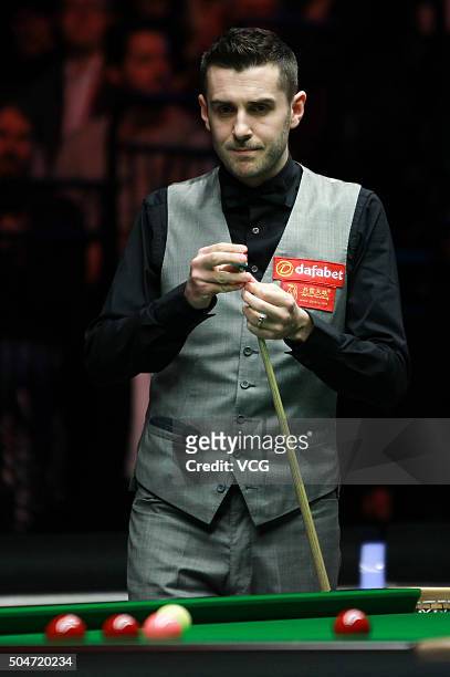 Mark Selby of England reacts in the first round match against Ricky Walden of England during day three of the Dafabet Masters 2016 at Alexandra...