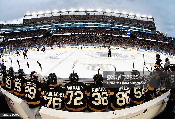 The Boston Bruins bench watch the game against the Montreal Canadiens in the 2016 Bridgestone NHL Classic at Gillette Stadium on January 1, 2016 in...