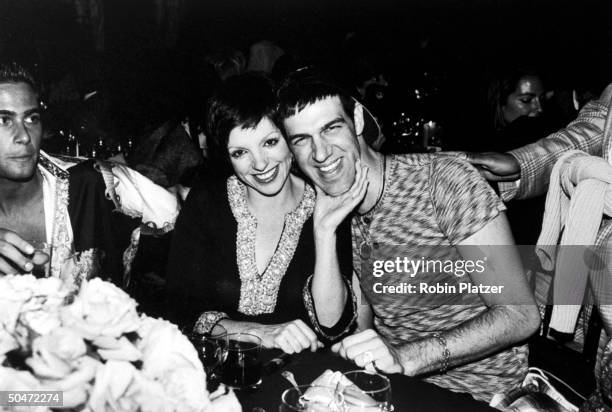 Singer Liza Minnelli and makeup man Kevyn Aucoin at the benefit Gianni Versace threw for AMFAR.