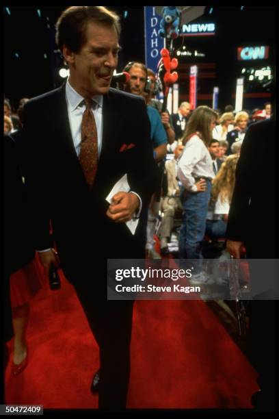 Network anchorman Peter Jennings walking floor during Repub. Natl. Convention.