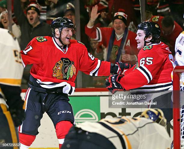 Marain Hossa and Andrew Shaw of the Chicago Blackhawks celebrate Shaw's second goal of the game in the second period against the Nashville Predators...