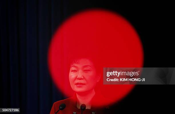 South Korea's President Park Geun-hye addresses the nation at the Presidential Blue House in Seoul on January 13, 2016. Park on January 13 urged the...