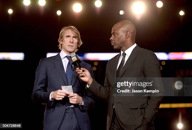 Director/producer Michael Bay and TV personality Kevin Frazier attend the Dallas Premiere of the Paramount Pictures film 13 Hours: The Secret...