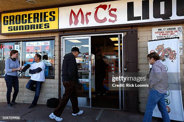 Becky Sullivan, of NPR, interviews Kenneth Chan, of Mr. C's Liquor in San Pedo, Ca. While people file in to purchase Powerball lottery tickets. The...