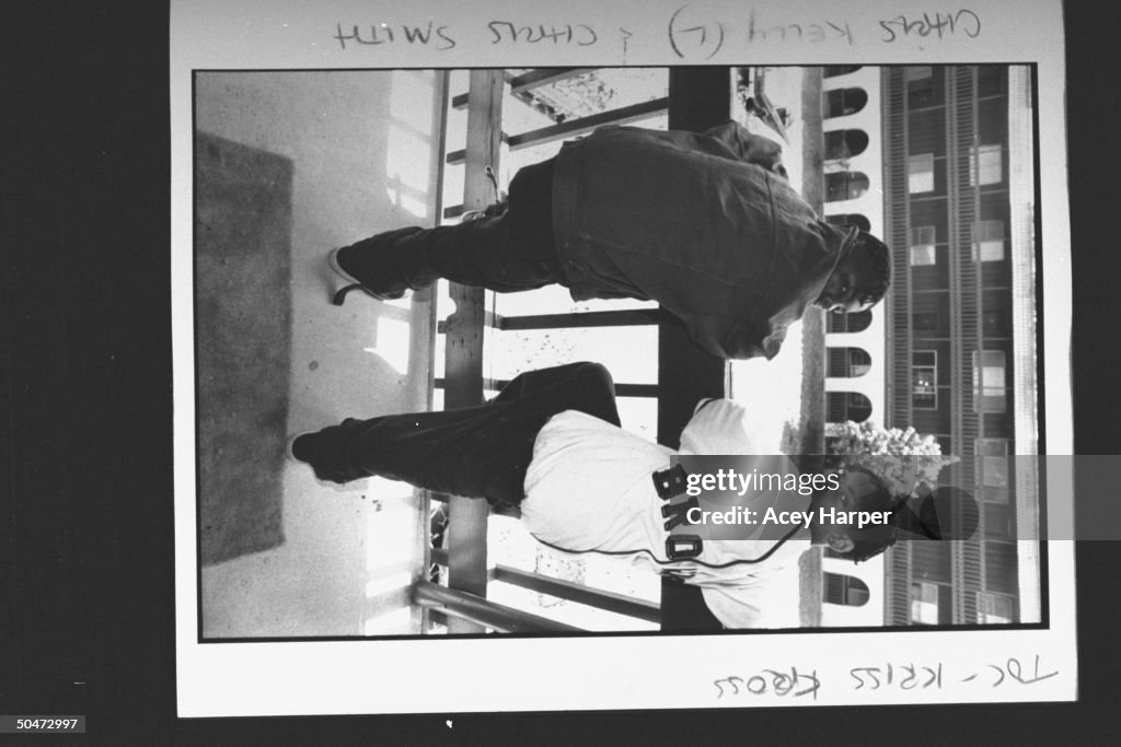 Kris Kross rap duo Mack Daddy & Daddy Mack posing at balcony railing ...