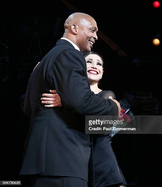 Actor and former NFL player Eddie George and Bianca Marroquin during the curtain call for George's first night in "Chicago" on Broadway at Ambassador...