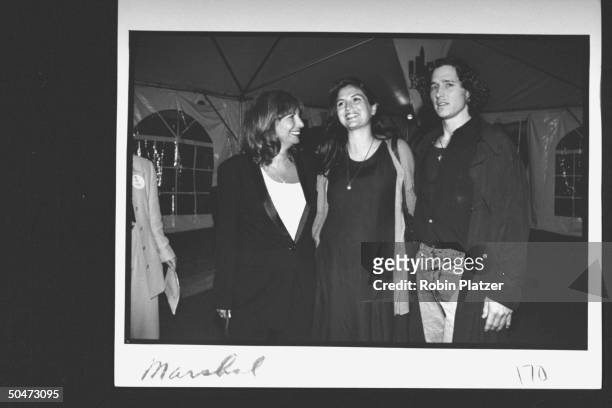 Movie dir./actress Penny Marshall chatting w. Her pregnant daughter Tracy Reiner & her live-in Dan Harvey at premiere party for the movie A League of...